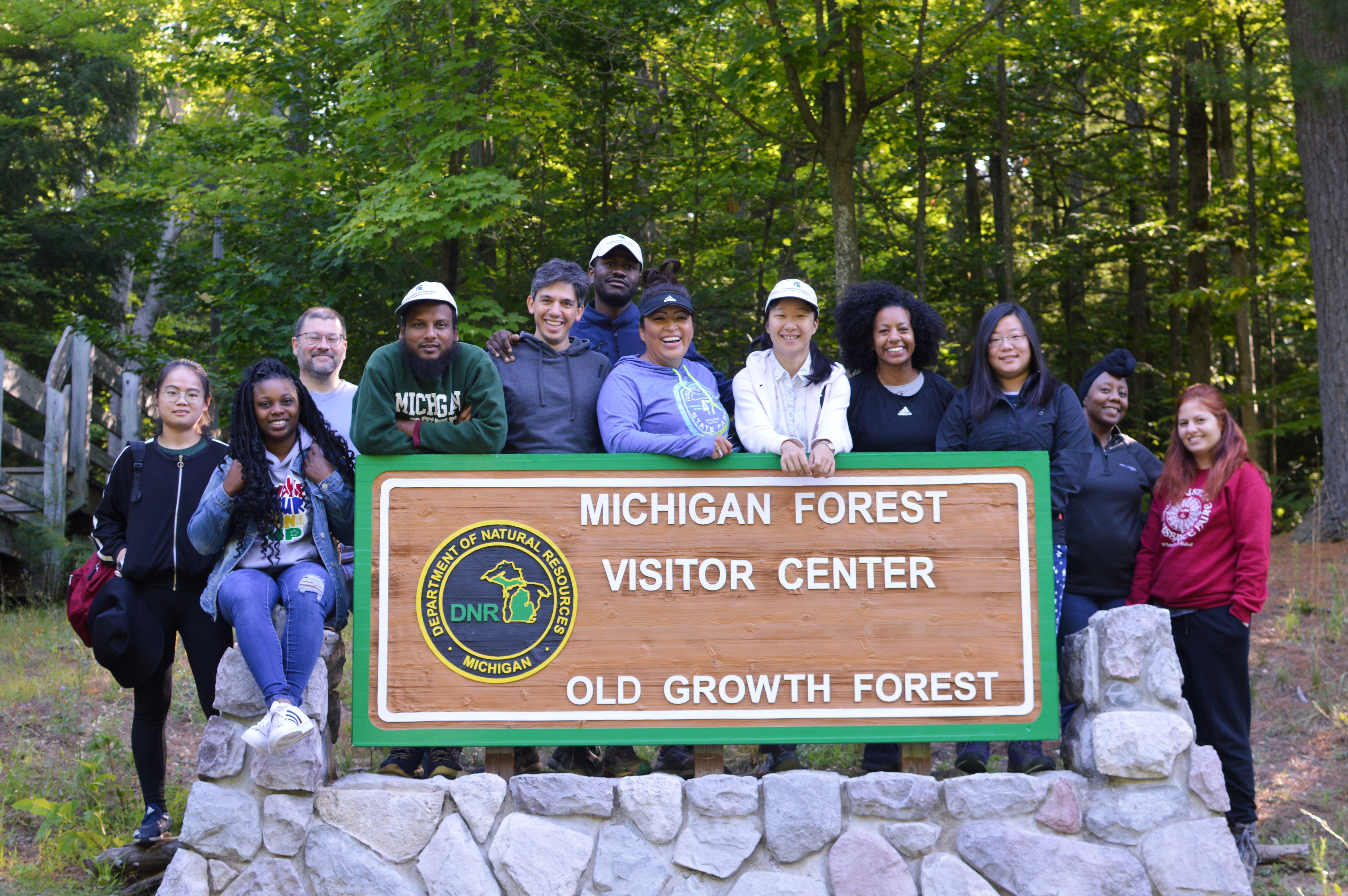 Dr. Nathan Moore and the 2019 entering Geography cohort at Hartwick Pines State Park