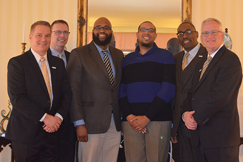 Blair Proctor and Justin Coles with representatives from TIAA at a reception in March, 2016.