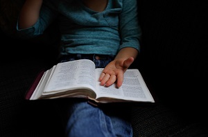 open book on lap