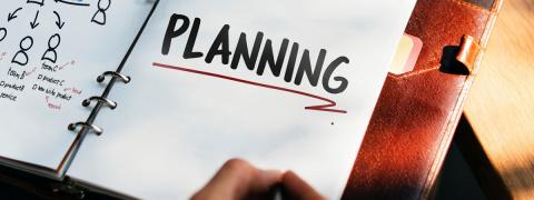 Notebook with the word "Planning" written in it