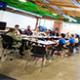 Photo of a group of people sitting at a large table