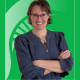 Educator of the Month Imari Cheyne Tetu in front of a green background with the Spartan helmet.