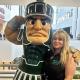 Kelly & Sparty Kelly standing with Sparty.