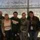 a group of postdocs with Office of Postdoctoral Affairs Director, Aaron Reifler at a MSU football game.