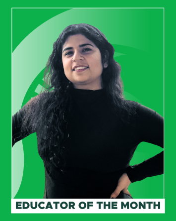 Educator of the Month Shikha Bhutani in front of a green background with the Spartan helmet.